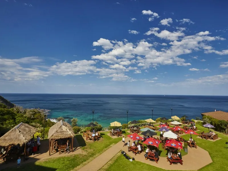 Billabong picnic tables overlooking the ocean at the Scarborough Hotel