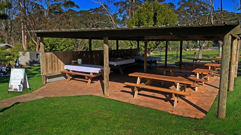 Outdoor picnic tables at Symbio Wildlife Park