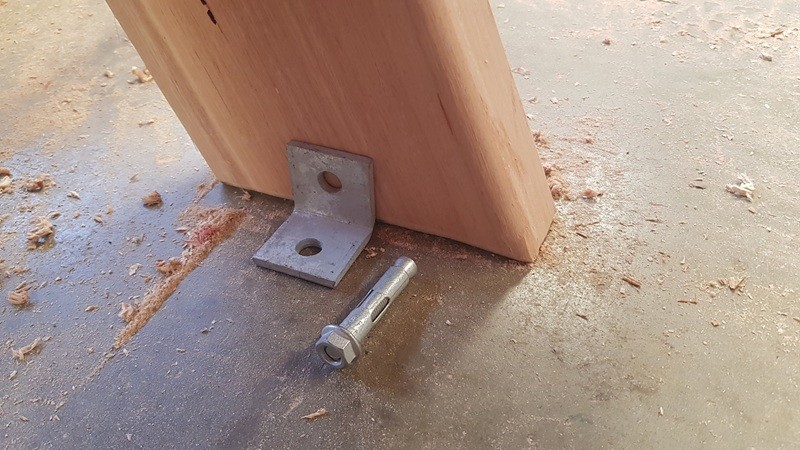 Bolting down a picnic table to a concrete slab