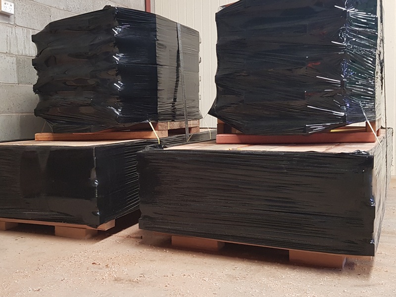 Ten picnic tables flat packed and headed to Melbourne