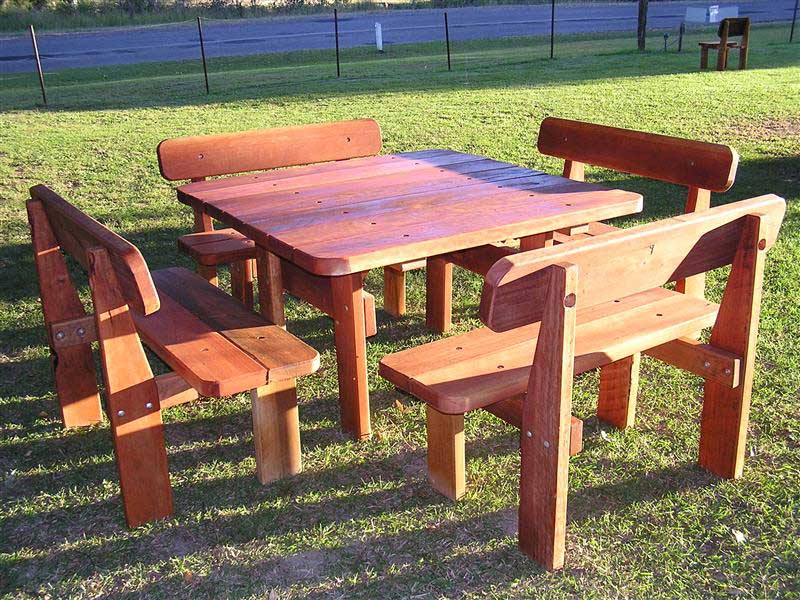 Square picnic setting sitting on grass